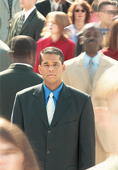 A man surrounded by a crowd of people