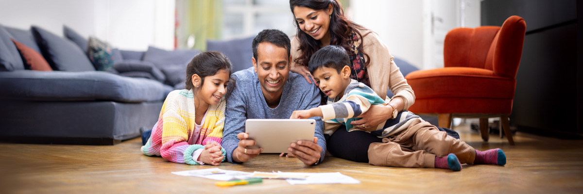 Parents use Bible study tools with their sons