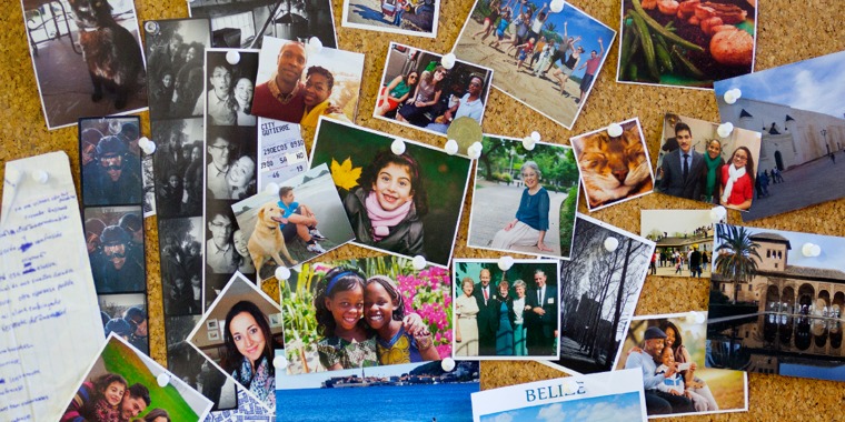 Pictures of friends, family, pets, and other memorabilia, pinned to a cork board
