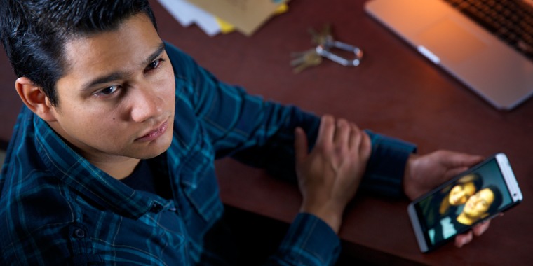 A young man thinking about the girl he broke up with