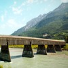 A covered bridge over a river in Liechtenstein