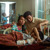 Родители гледаат во своето синче кое лежи во болнички кревет со ампутирана рака.