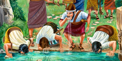 Los soldados de Gedeón beben agua mientras miran a su alrededor