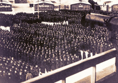 Thousands of prisoners standing outside in wintertime at Sachsenhausen concentration camp.