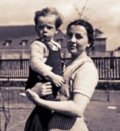 Gertrud Poetzinger holding an officer’s child.