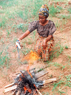 A woman burns her magical objects