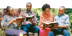 A family reads the Bible together