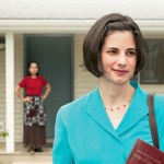 A sister walks away from an irritated householder