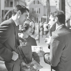 A brother directing a couple where to preach in an assigned territory.