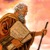 Moses holds the two stone tablets containing the Ten Commandments