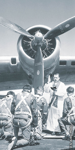 A priest blesses soldiers