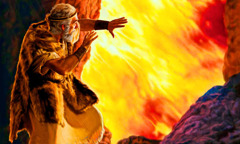 एलियाह गुफा के मुहाने पर खड़ा होकर खुद को आग से बचा रहा है