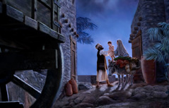 ในคืนที่มืดมิด โยเซฟอุ้มเด็กน้อยเยซูส่งให้มาเรียขณะที่เตรียมตัวเดินทาง