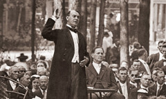 J. F. Rutherford delivering a talk at a convention of Bible Students in 1919