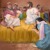 As Jesus reclines with the other guests at the table, a woman kneels at his feet