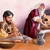 A Pharisee washes his hands up to the elbow and looks critically at a man who has already started eating