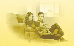 Una parella jove llig la Bíblia i fa búsquedes en línia