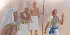يوسف واقف امام فرعون يشرح له حلميه