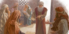 زكريا يشير الى اللوح الذي كتب عليه اسم ابنه ليخبر اصدقاءه وأقرباءه ان ابنه سيدعى يوحنا