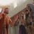 Farizeji zaslišujejo moškega, ki je bil prej slep.
