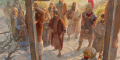 Jésus est cloué à un poteau. Un chef d’armée et certains disciples de Jésus, comme Marie et Jean, sont à côté de lui