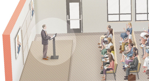 A. A male Witness giving a Bible-based talk from the stage during a meeting.