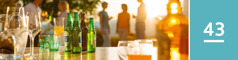 Lesson 43. Alcoholic and nonalcoholic beverages sit on a counter at a gathering.