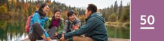 Lesson 50. A family talk together on a dock at a beautiful lake.