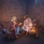 Jesus and Nicodemus conversing at night in a courtyard.