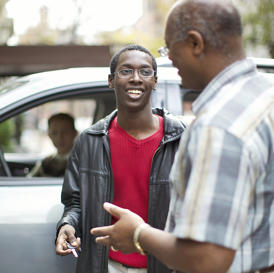 A Father Giving His Teenage Son The Car Keys A Father Giving His Teenage Son The Car Keys