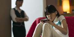 A girl reading a text message