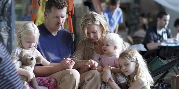 A family praying