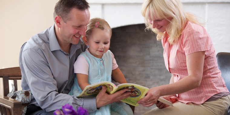 Ivars Vigulis and his wife teach their daughter about paradise