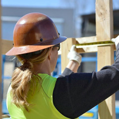 A sister working on a construction site