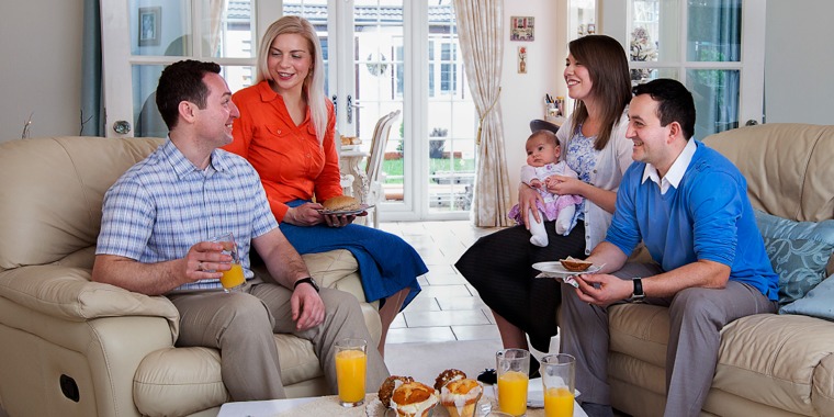 Pawel and Esther Pyzara enjoy refreshments with another couple
