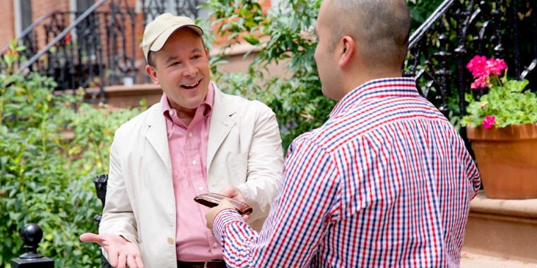 A man returns a wallet to its owner