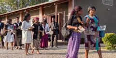 Jehovah’s Witnesses in Zambia leave the Kingdom Hall to go in field service
