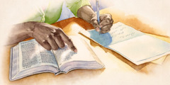 A person writes a comforting scripture in a card