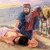 The good Samaritan approaches an injured Jewish traveler