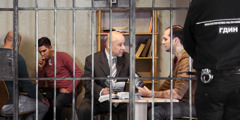 Reenactment of a Bible study being conducted in a Bulgarian prison with an interested inmate