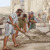 Israelite men and women laboriously rebuilding Jerusalem’s walls.