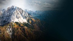 A frase “A Rocha — perfeito é tudo o que ele faz”, de Deuteronômio 32:4, aparece ao lado da foto de uma montanha.