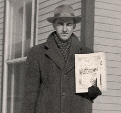 Brother André hold “Watchtower” for hand.