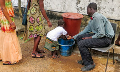 A hand-washing station outside a Kingdom Hall in West Africa