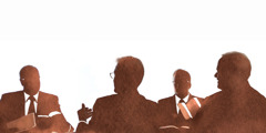 Silhouette of a Governing Body committee meeting