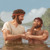 John the Baptist baptizing a man in a river.