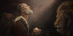 El profeta Daniel le ora a Dios en el foso de los leones.
