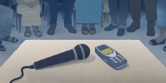 A group of people gathering together to study the Bible by phone. A microphone is placed near the phone so that everyone can hear the lesson.