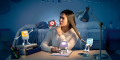 A girl shushing imaginary characters that are distracting her from studying. The characters represent music, videos, text messages, and pictures.