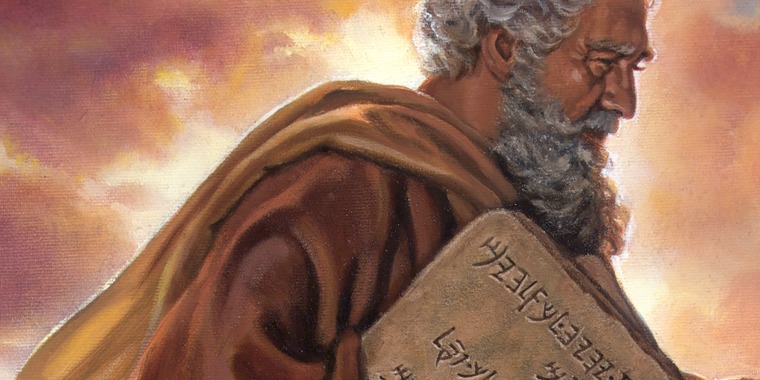 Moses carrying stone tablets